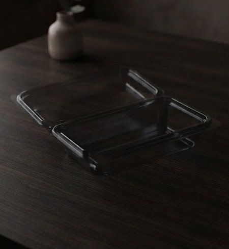 Clear Plastic Clamshell With Attached Lid